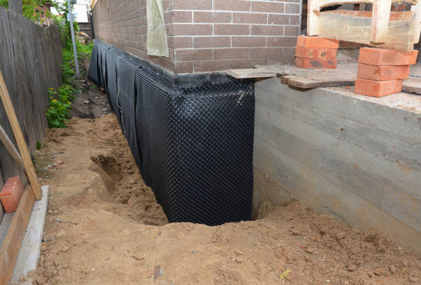 Happy homeowners after waterproofing job in Rossford